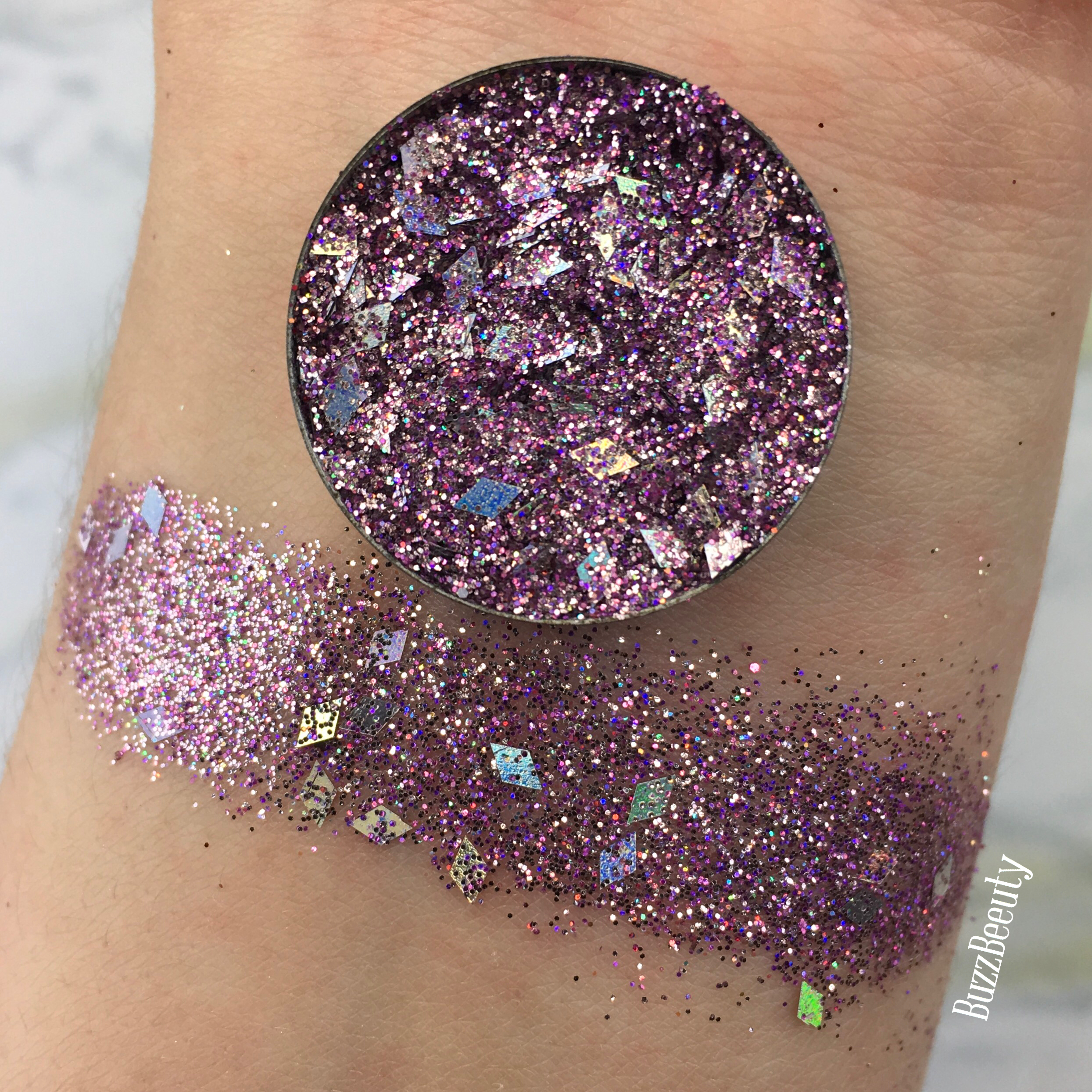 Dear Katie Brown Pressed Glitter Swatch in Elissa. Light purple with chunky diamond holographic glitters. 