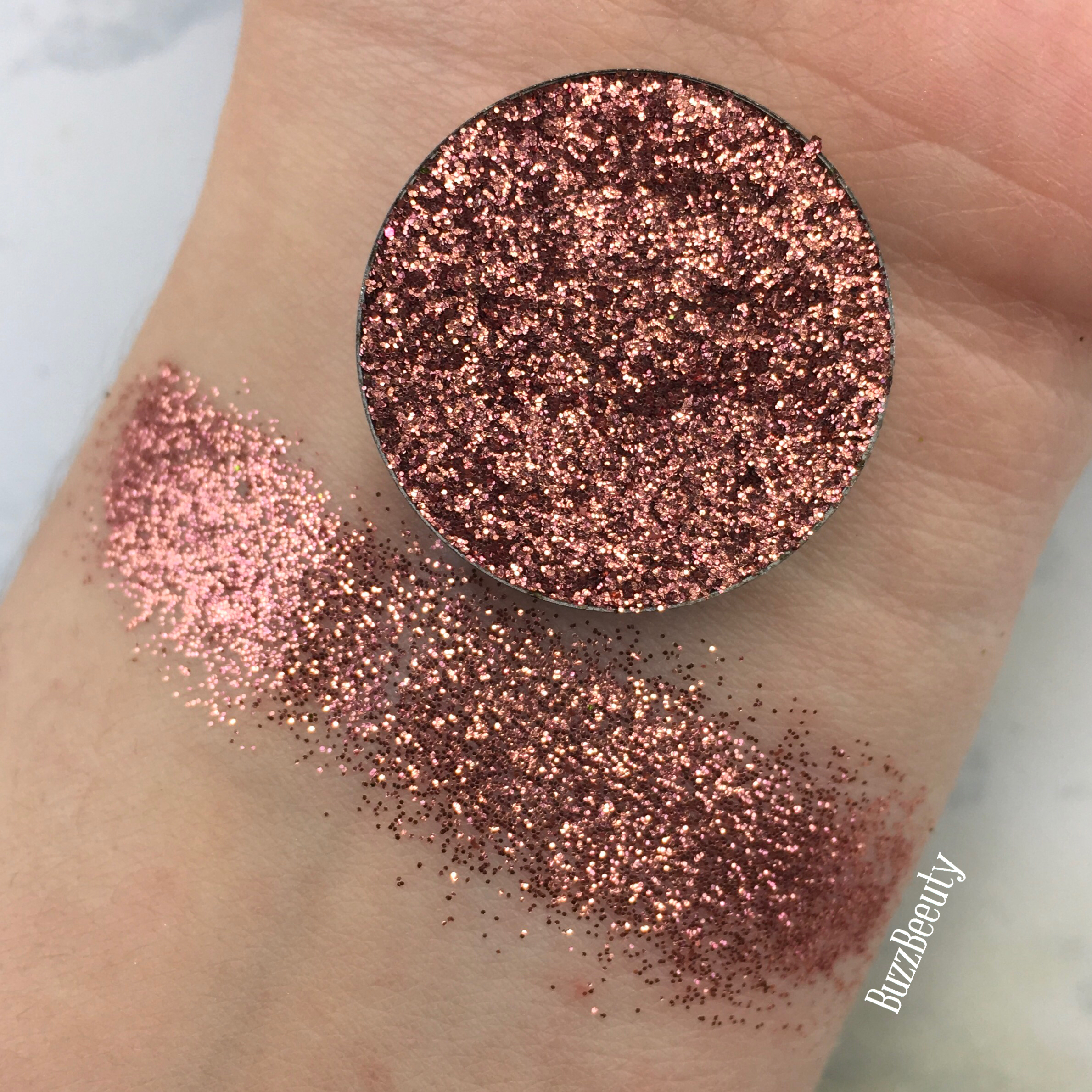 Dear Katie Brown Pressed Glitter Swatch in Leslie. Warm Copper/rose gold metallic glitter.