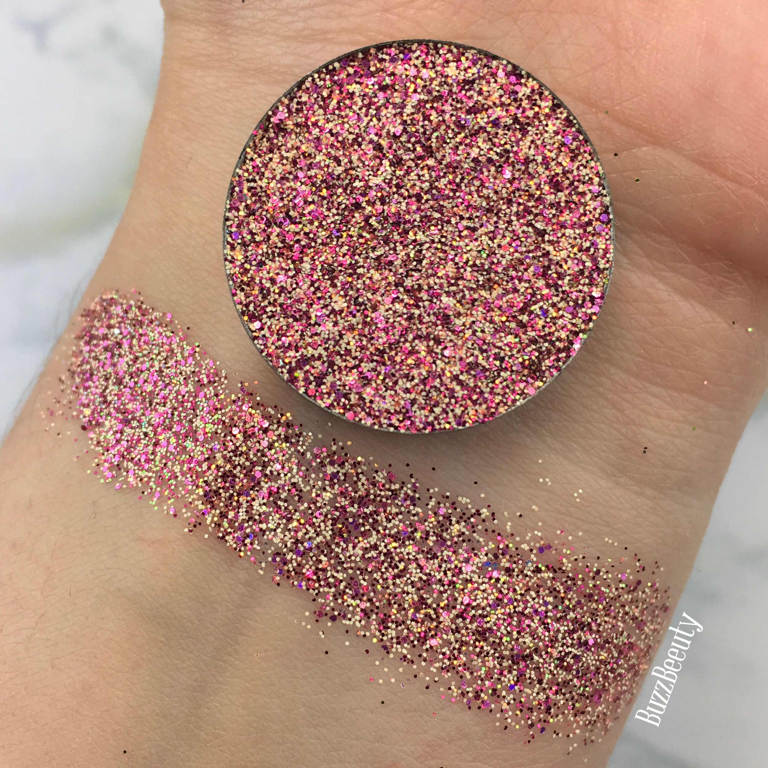 Dear Katie Brown Pressed Glitter Swatch in Sandi. Pink and Orange sunset glitter.